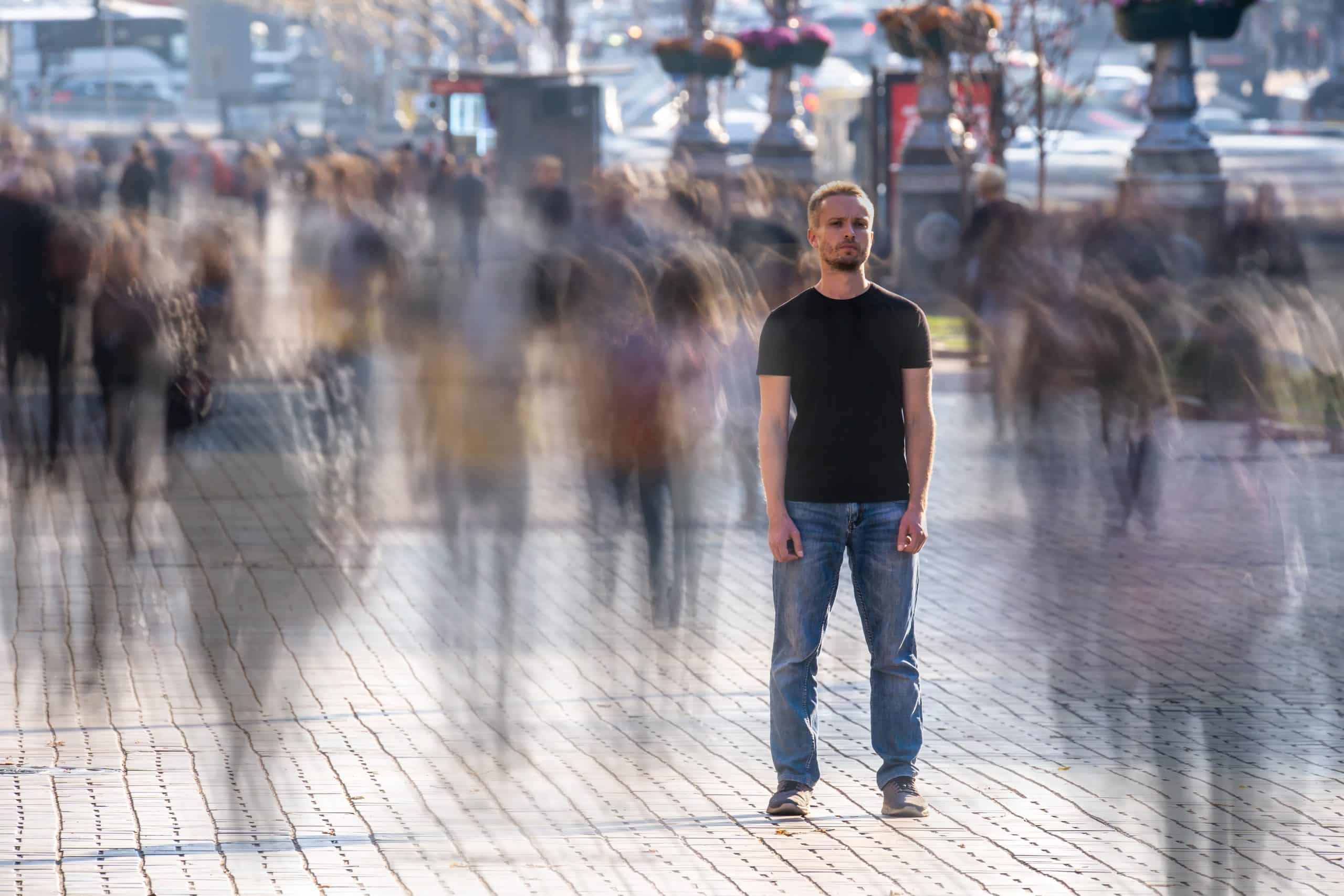 Man in a crowd, blurred movement - F3 Private Investigations specializes in locating individuals and surveillance.