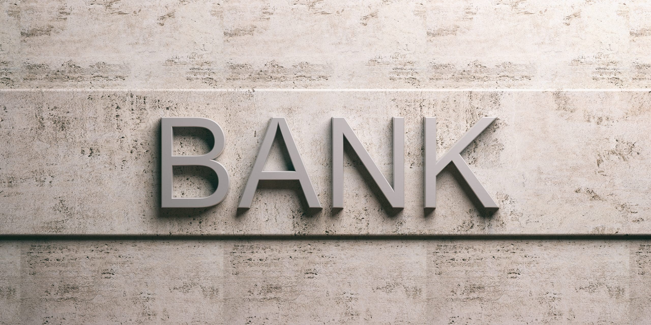 Bank sign on concrete wall