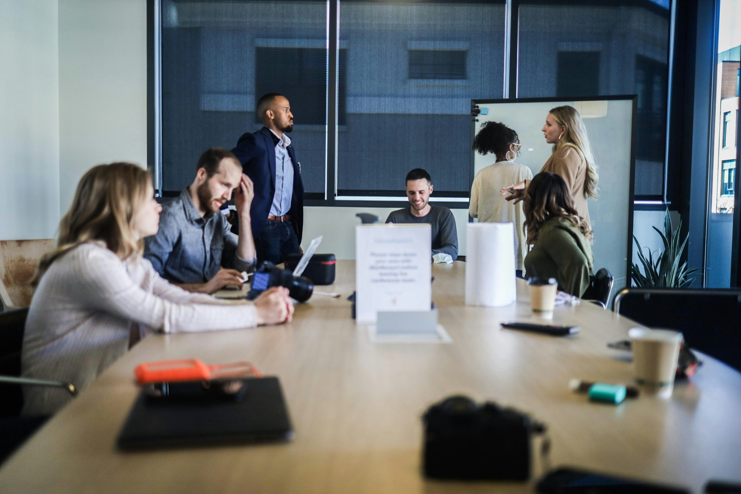 Office team meeting around conference table